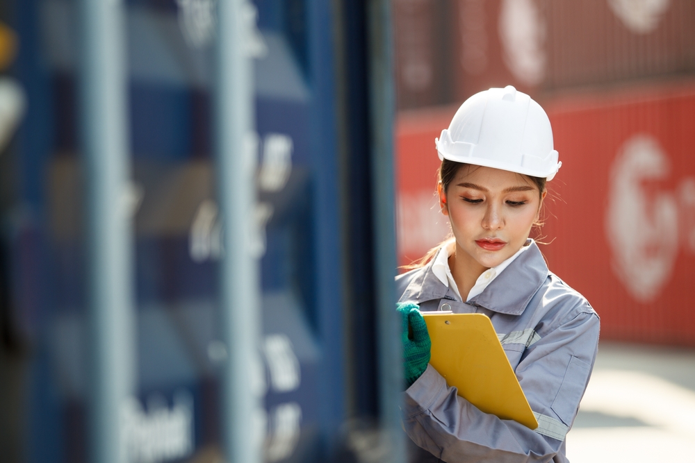 Customs Clearance Officer Checking The Imported Cargo