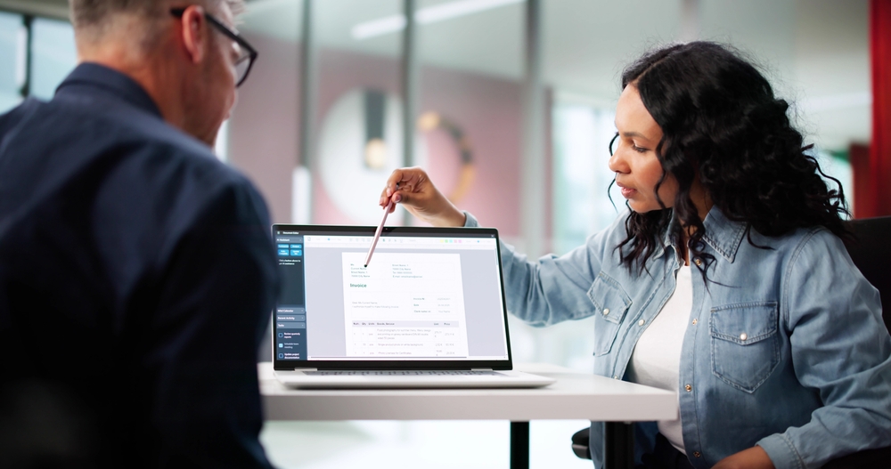 Payroll Manager And Bookkeeper Auditing Freight Bill