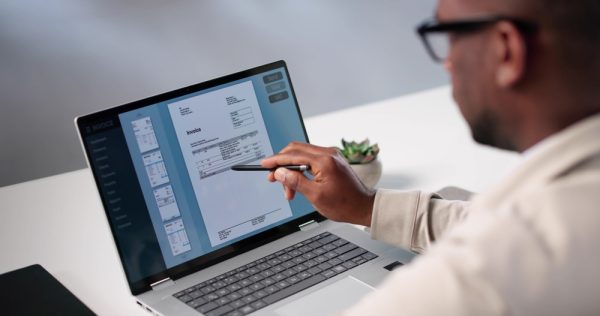 Busy Accountant Uses Invoice Software To Calculate Taxes For Clients