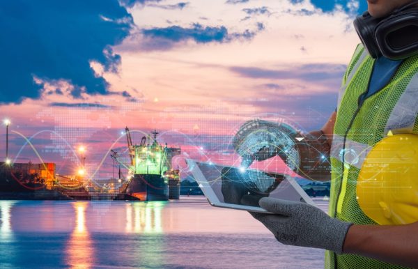 Worker At Shipping Port Uses Tablet With Futuristic Digital Interface