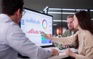 Businesswoman Managing Company Data Using Analytics Dashboard For Financial Performance.