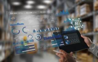 Ai-powered Business Analytics Dashboard Above A Tablet In A Warehouse