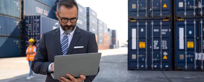 Warehouse Manager Using Laptop