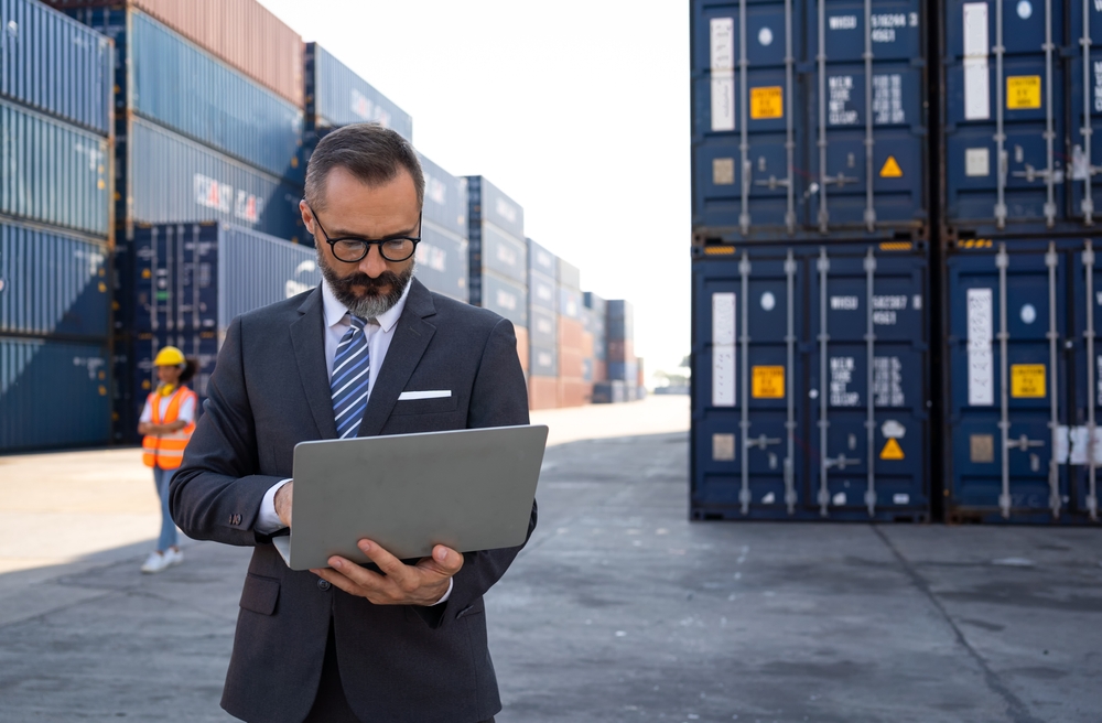 Warehouse Manager Using Laptop
